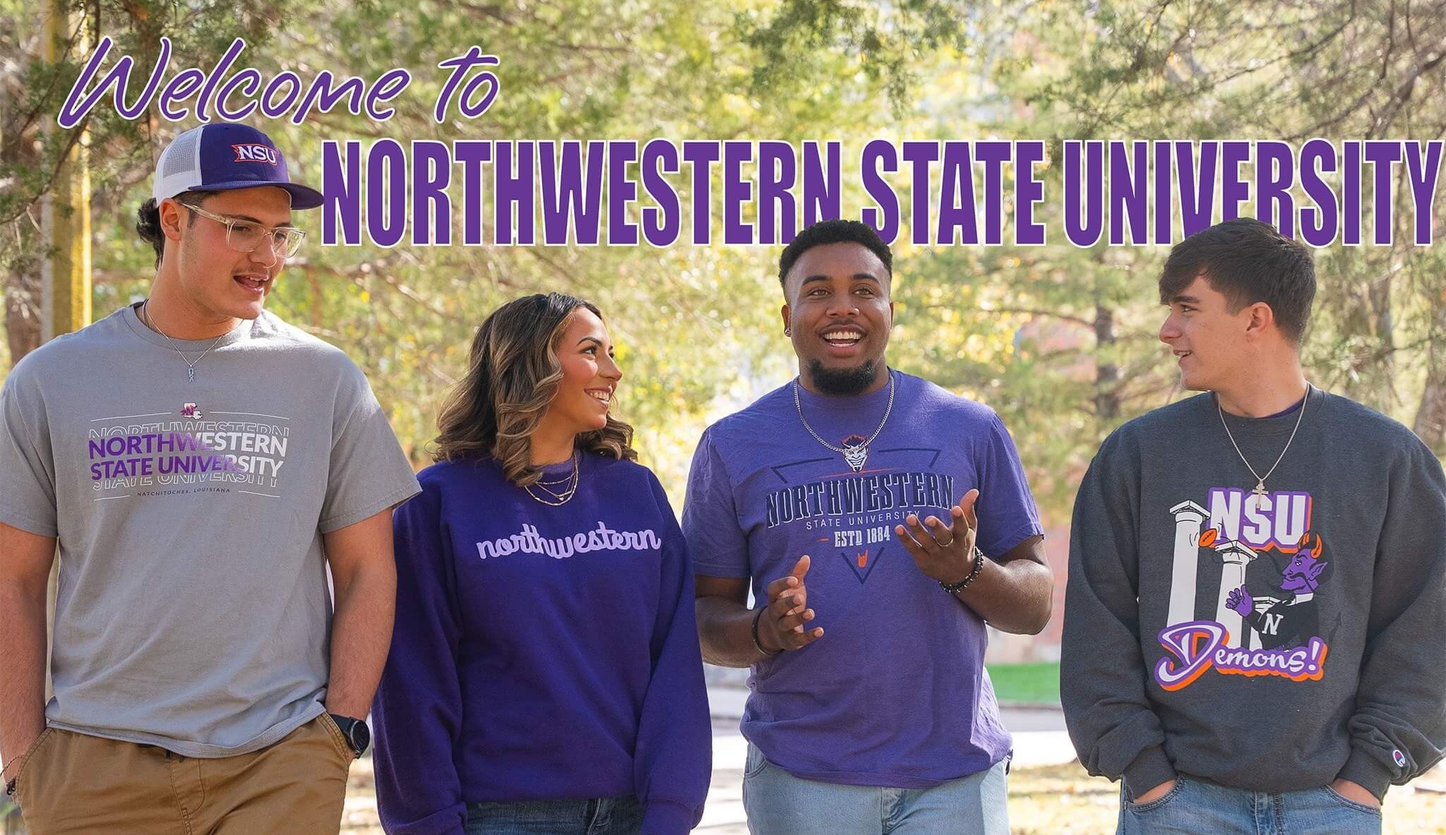 Banner: Welcome to Northwestern State University. Four students wearing NSU shirts converse and walk along a tree-lined path.